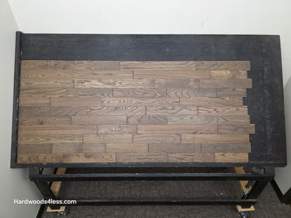 3 1/4" x 3/4" Solid Red Oak Coal Hardwood Flooring. Shown on a black shooting table. Center shot.