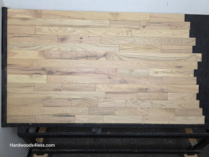 3 1/4" x 3/4" Solid Red Oak Khaki Hardwood Flooring. Shown on a black shooting table. Shot from center.