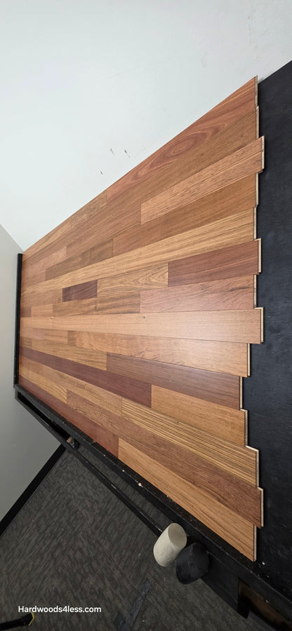 3 1/4" x 3/8" Engineered Brazilian Cherry Hardwood Flooring. Shown on a black shooting table. Shot from tight right.