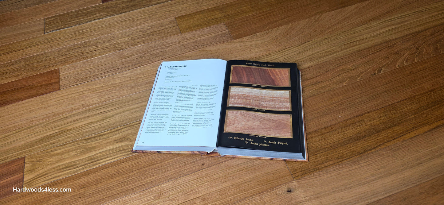 3 1/4" x 3/8" Engineered Brazilian Cherry Hardwood Flooring. Shown center frame is a Hardwood book. Open to a random similar page. The book is on top of the Engineered Brazilian Cherry.