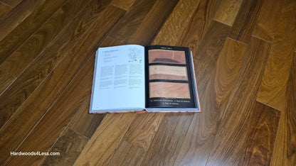 3 1/4" x 3/8" Engineered Brazilian Walnut (IPE) Natural Hardwood Flooring. A Hardwood book is shown in the center. Open to a page labeled California Walnut. Under the book is the Brazilian walnut hardwood flooring.