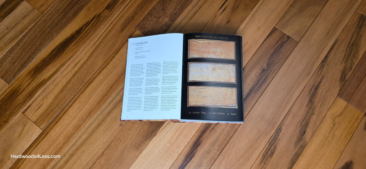 3 1/4" x 3/8" Engineered Tigerwood Hardwood Flooring. Shown in the center of the tigerwood flooring is a hardwood book. The book is open to a random page.
