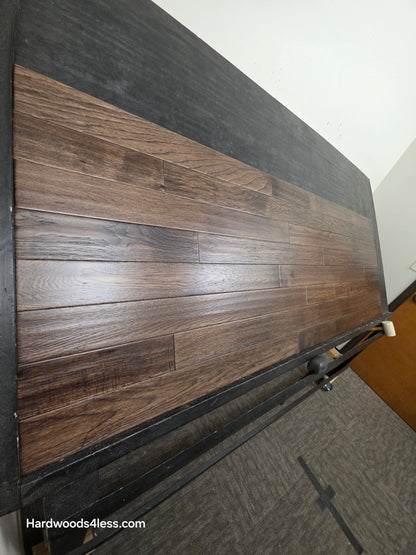3 3/4" x 3/4" Solid Hickory Prescott Hardwood Flooring. Shown on a black shooting table. Shot from steep left.
