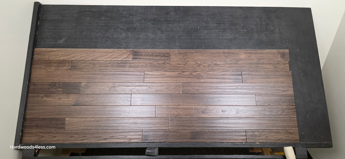 3 3/4" x 3/4" Solid Hickory Prescott Hardwood Flooring. Shown on a black shooting table. Shot from center.