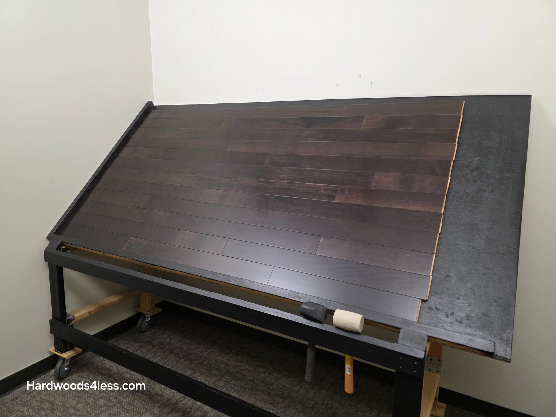 3 5/8" x 3/4" Solid Brazilian Oak Burnt Umber Hardwood Flooring. Shown on a black shooting table. Shot from wide right.