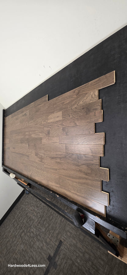 3" x 3/8" Engineered Red Oak Mace Hardwood Flooring. Shown on a black shooting table. Shot from steep right.