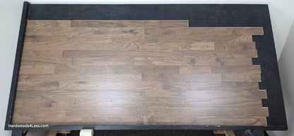 3" x 3/8" Engineered Red Oak Mace Hardwood Flooring. Shown on a black shooting table. Shot from center.