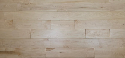 Maple HardWood flooring with a light brown color and visible grain pattern.