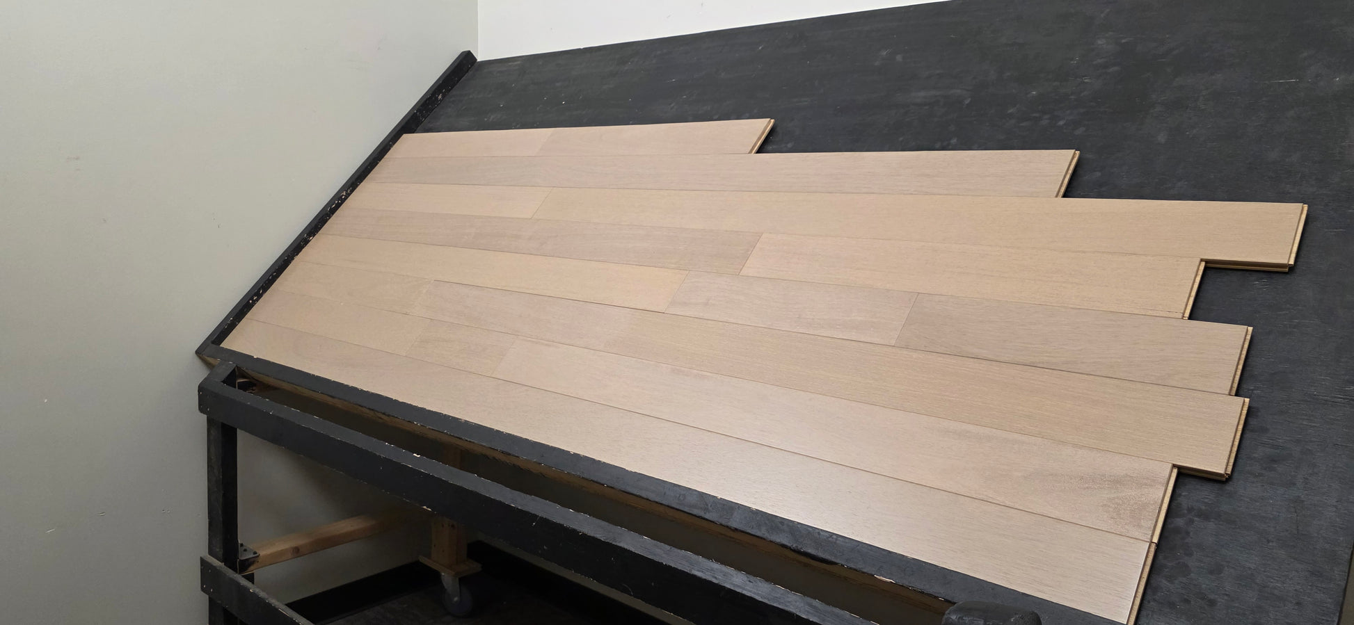 4" x 3/4" Solid Brazilian Oak Deriva Hardwood Flooring on a black racking table shot from the right hand side