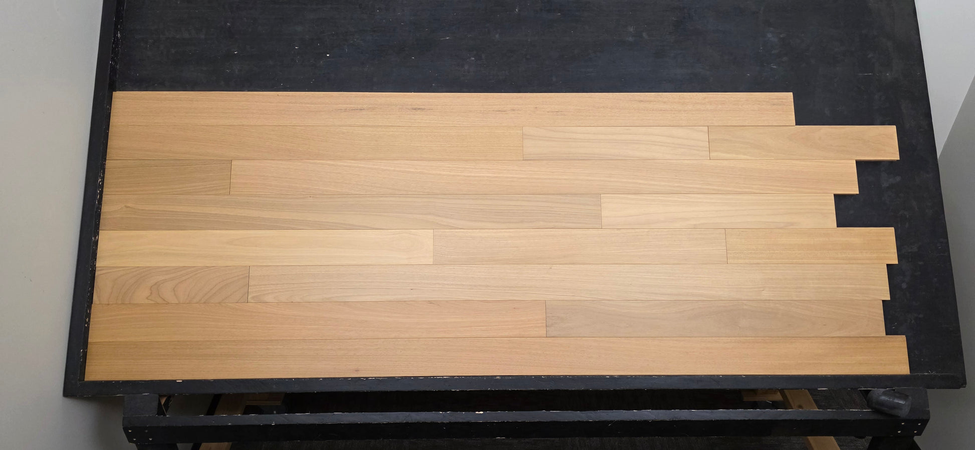 4" x 3/4" Solid Brazilian Oak Natural Hardwood Flooring straight on shot on black shooting rack