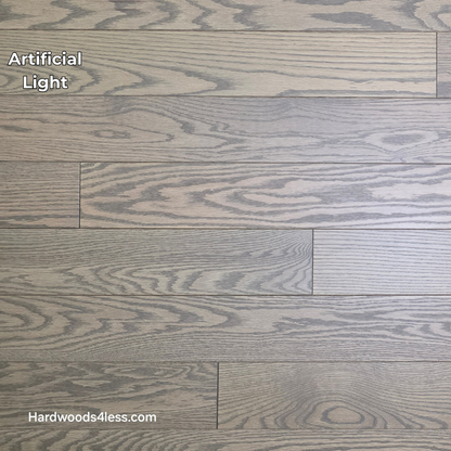 4" x 3/4" Solid Red Oak Barrel Hardwood Flooring. Shown in artificial lighting. 