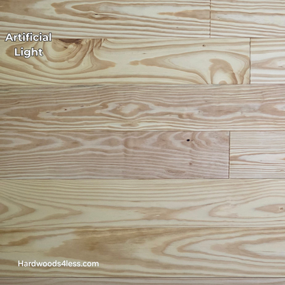 5 1/8" x 3/4" Southern Yellow Pine Wire Brushed Natural Solid Hardwood Flooring. Shown in artificial lighting.