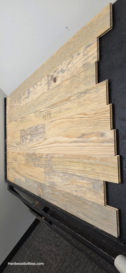 5 1/8" x 3/4" Unfinished Southern Yellow Pine Solid Flooring. Shown on a black shooting rack. Shot steep from the right hand side. 