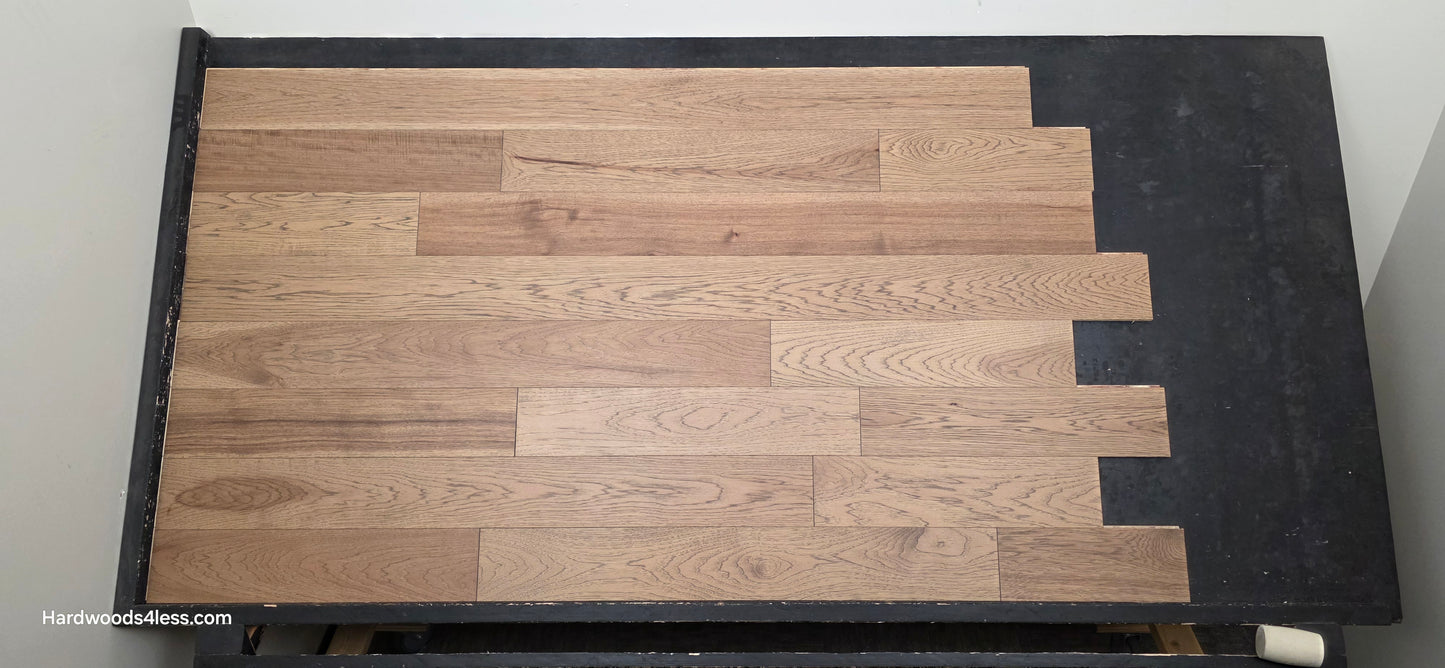 5 38 x 12 Engineered Hickory Cunningham Hardwood Flooring. Shown on a black shooting table. Shot from center.