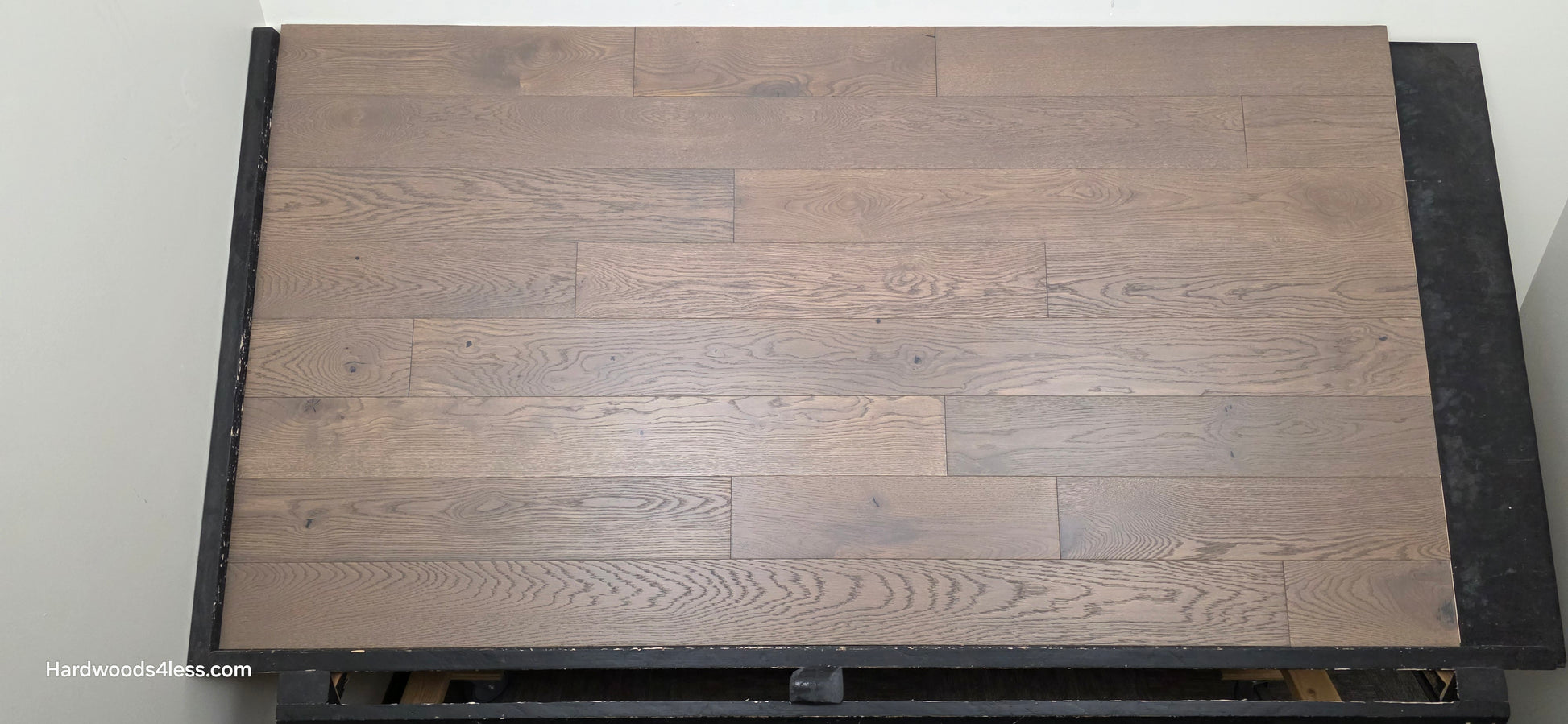 5 7/8" x 9/16" Engineered European Oak Roanoke Ridge Hardwood Flooring shown on a black shooting table. Shot head on.