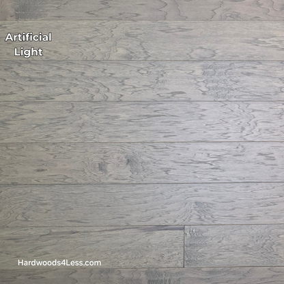 5" x 1/2" Engineered Hickory Flagstone Hardwood Flooring. Shown in artificial lighting.