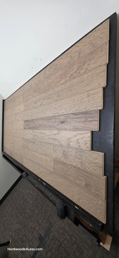 5" x 1/2" Engineered Hickory Flagstone Hardwood Flooring. Shown on a black shooting table. Shot from tight right.