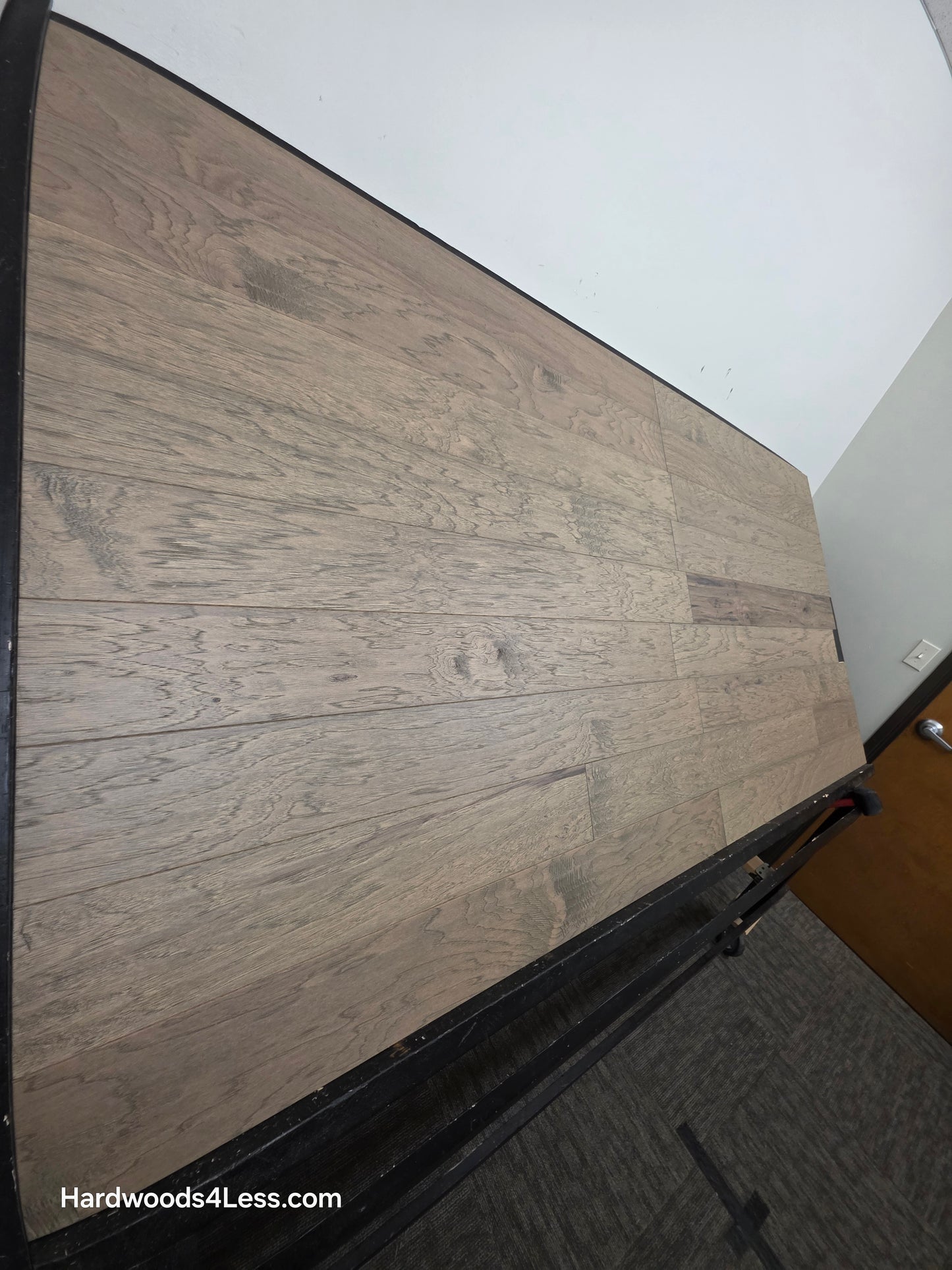 5" x 1/2" Engineered Hickory Flagstone Hardwood Flooring. Shown on a black shooting table. Shot from tight left.