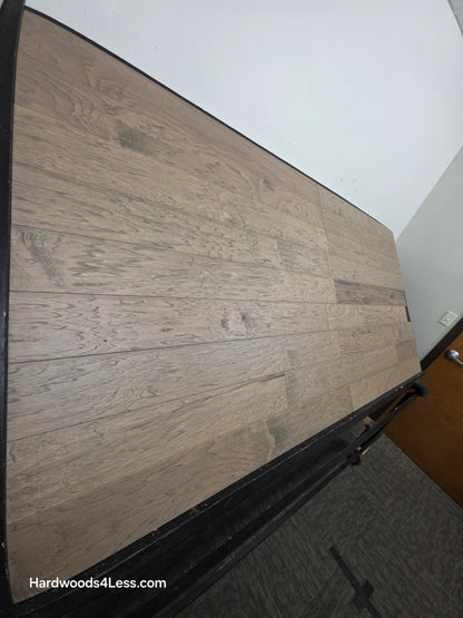 5" x 1/2" Engineered Hickory Flagstone Hardwood Flooring. Shown on a black shooting table. Shot from tight left.