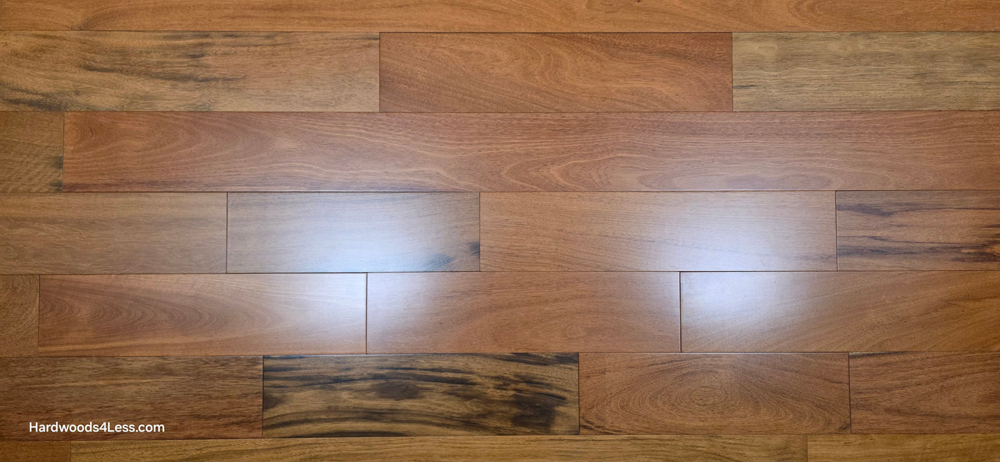 5" x 3/4" Prefinished Brazilian Cherry Shorts Hardwood Flooring. Show close up with a wide format.