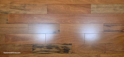 5" x 3/4" Prefinished Brazilian Cherry Shorts Hardwood Flooring. Show close up with a wide format.