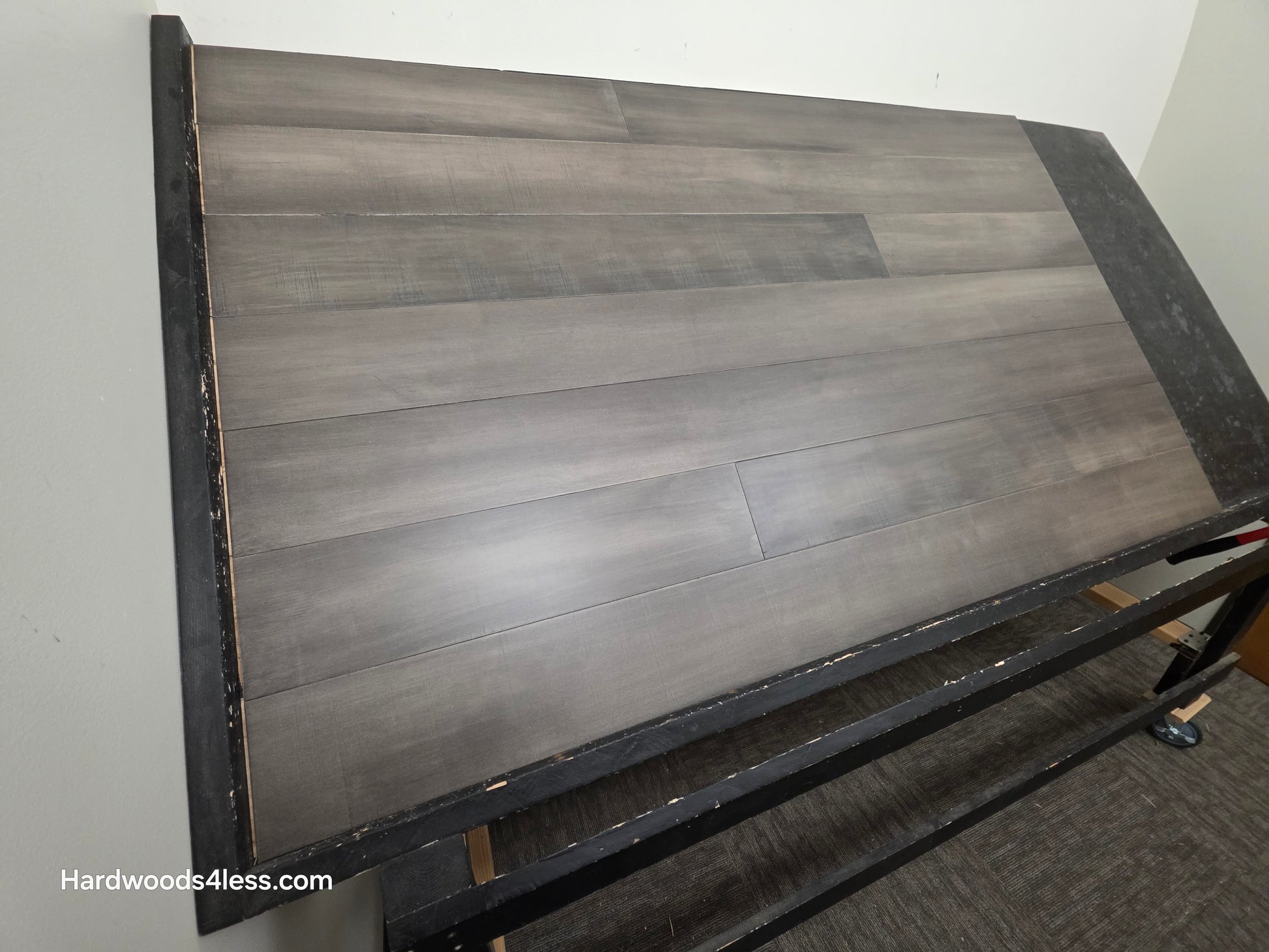 6 1/2" x 1/2" Engineered Maple Autumn Ash Hardwood Flooring. Shown on a black shooting table