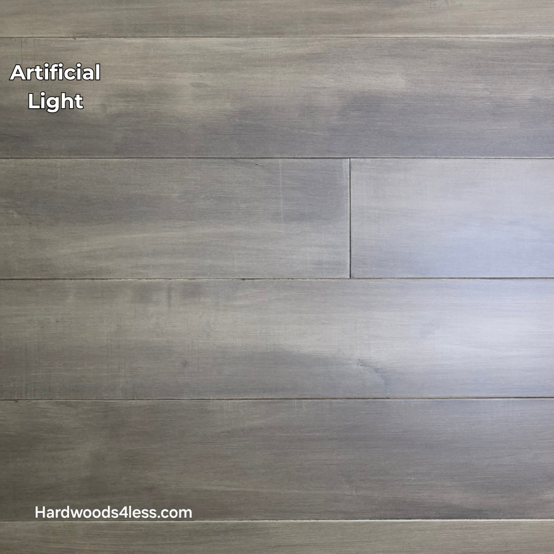 6 1/2" x 1/2" Engineered Maple Peat Hardwood Flooring. Shown in artificial lighting.