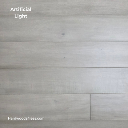 6 1/2" x 1/2" Engineered Maple Polar Palace Hardwood Flooring shown in artificial lighting