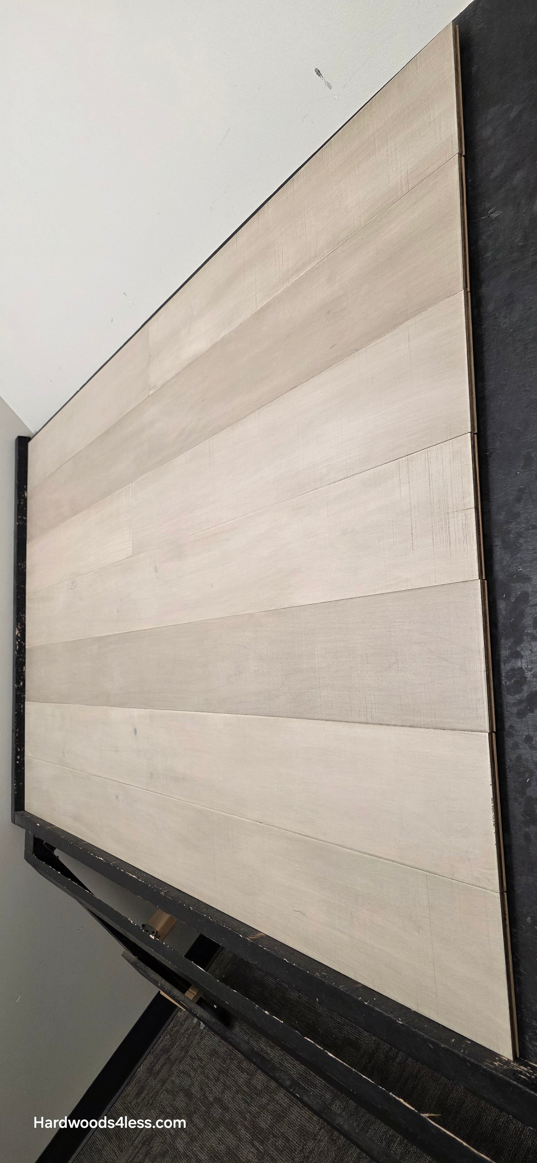 6 1/2" x 1/2" Engineered Maple Satin Sunrise Hardwood Flooring. Shown close up. Steep shot on the right side