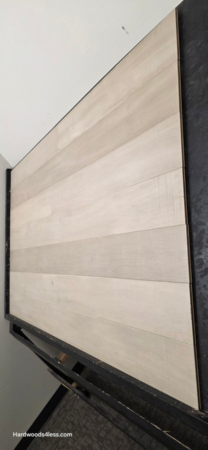 6 1/2" x 1/2" Engineered Maple Satin Sunrise Hardwood Flooring. Shown close up. Steep shot on the right side
