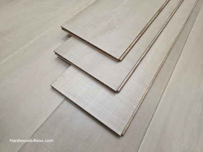 6 1/2" x 1/2" Engineered Maple Satin Sunrise Hardwood Flooring close up of three tiles stacked on each other 