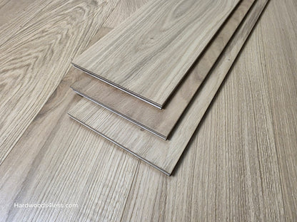 7 1/2" x 1/2" Engineered European White Oak Venice Hardwood Flooring. Shown as three tiles stacked atop the flooring. 