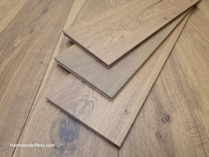 7 1/2" x 9/16" Engineered European Oak Rathlin Hardwood Flooring close up of three boards stacked on the floor.