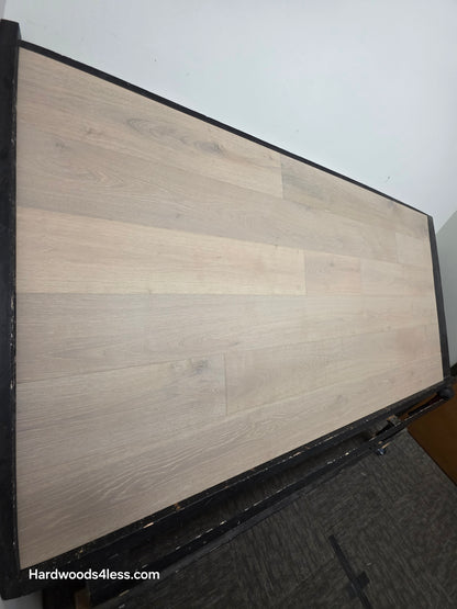 7 1/2" x 9/16" Engineered European Oak Sark Hardwood Flooring shown on a black shooting table. Shot from the left side.
