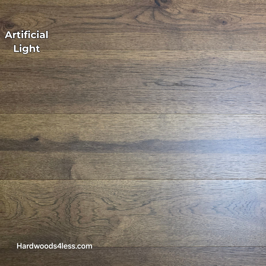 Close-up of 7 1/2" x 9/16" Engineered Hickory Alabay Hardwood Flooring with a visible brand name 'Hardwoods4less.com'.
Shown in Artificial lighting.