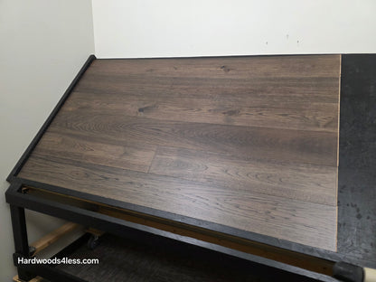  7 1/2" x 9/16" Engineered Hickory Quarry Hardwood Flooring. Shown on a black shooting table. Shot from wide right.