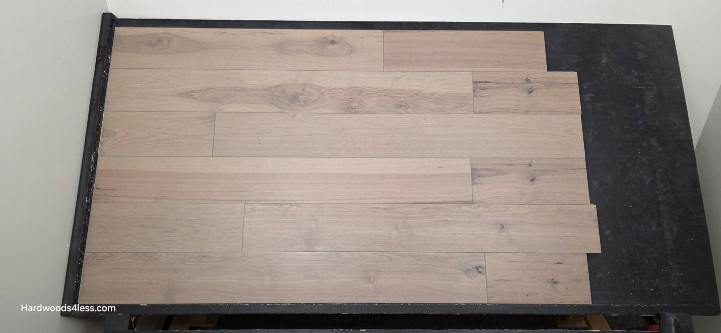 7 3/8" x 1/2" Engineered Hickory Fort Concho Hardwood Flooring. Shown on a black shooting table. Shot from center. 