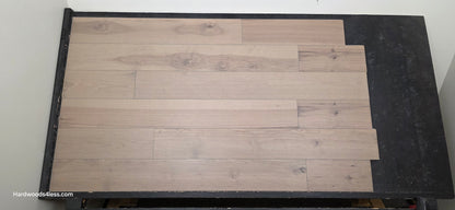 7 3/8" x 1/2" Engineered Hickory Fort Concho Hardwood Flooring. Shown on a black shooting table. Shot from center. 