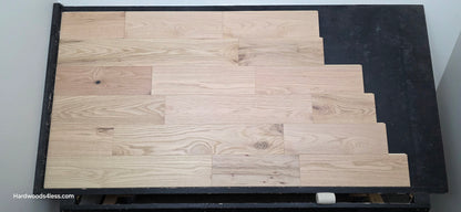 7 3/8" x 1/2" Engineered Red Oak San Bernard Hardwood Flooring. Shown on a black shooting table. Center shot.