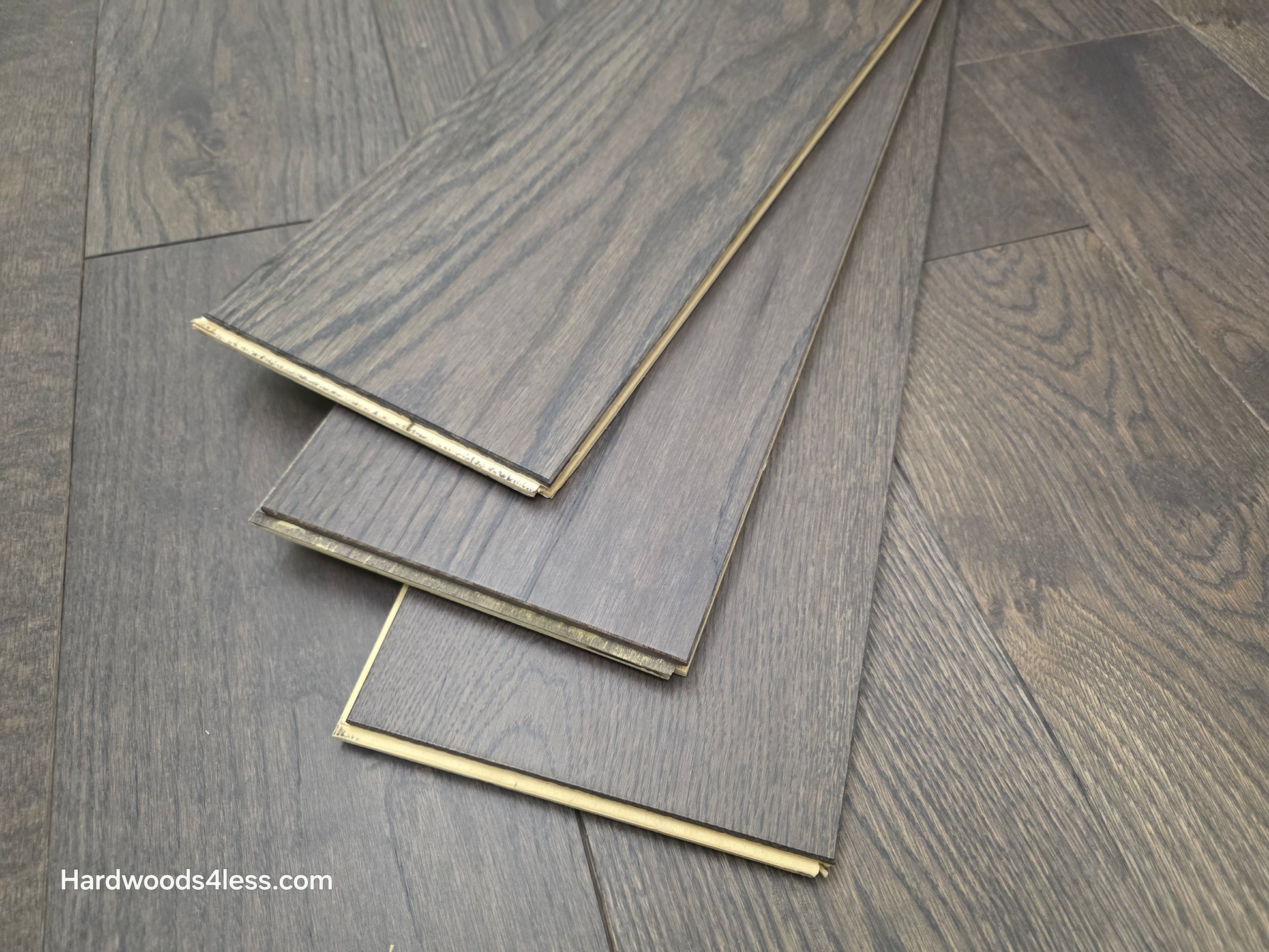 7 3/8" x 5/8" Engineered White Oak Toasted Cocoa Hardwood Flooring. Shown as 3 tiles stacked atop eachother.