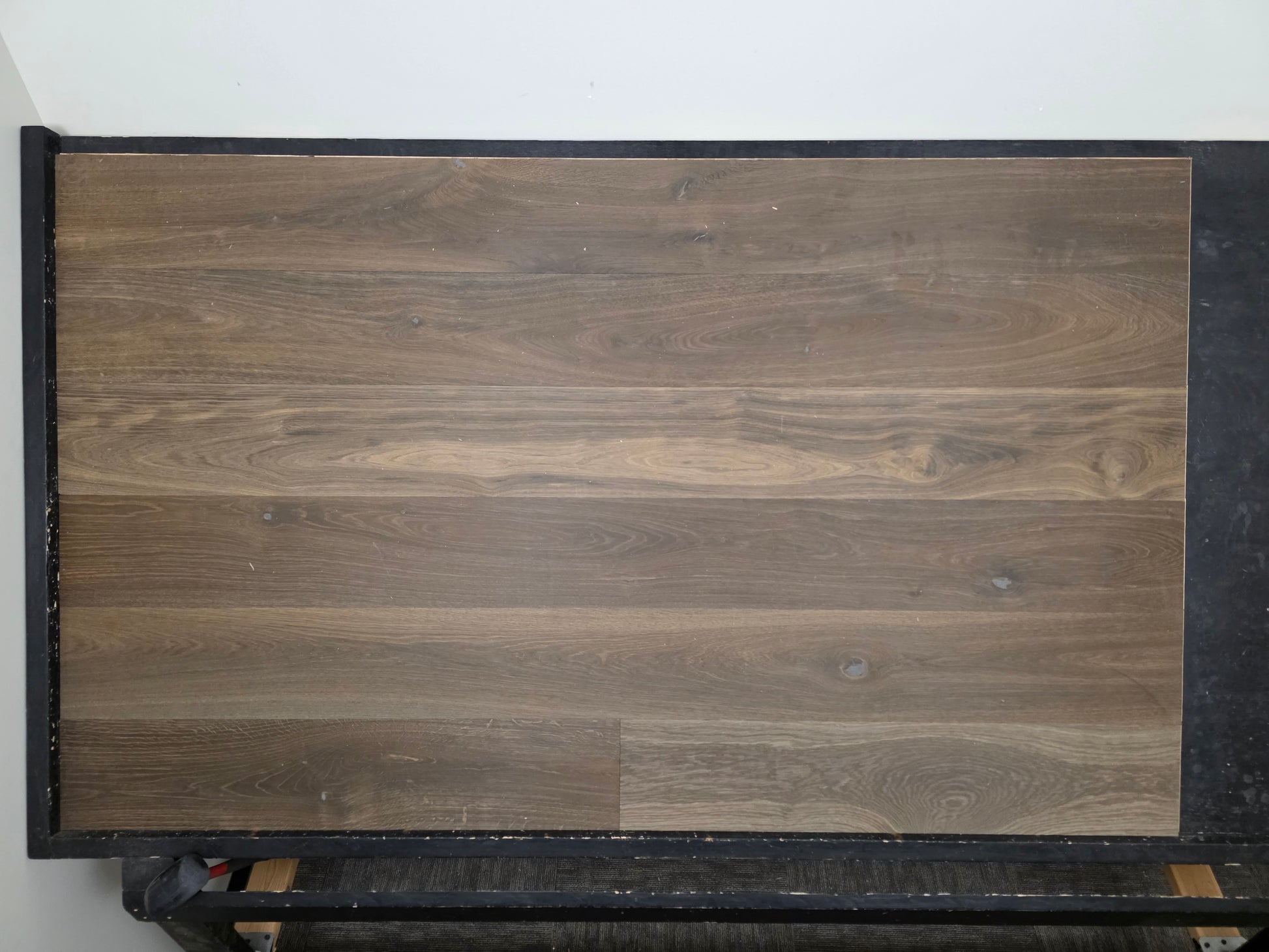 smoked European oak hardwood flooring on racking table