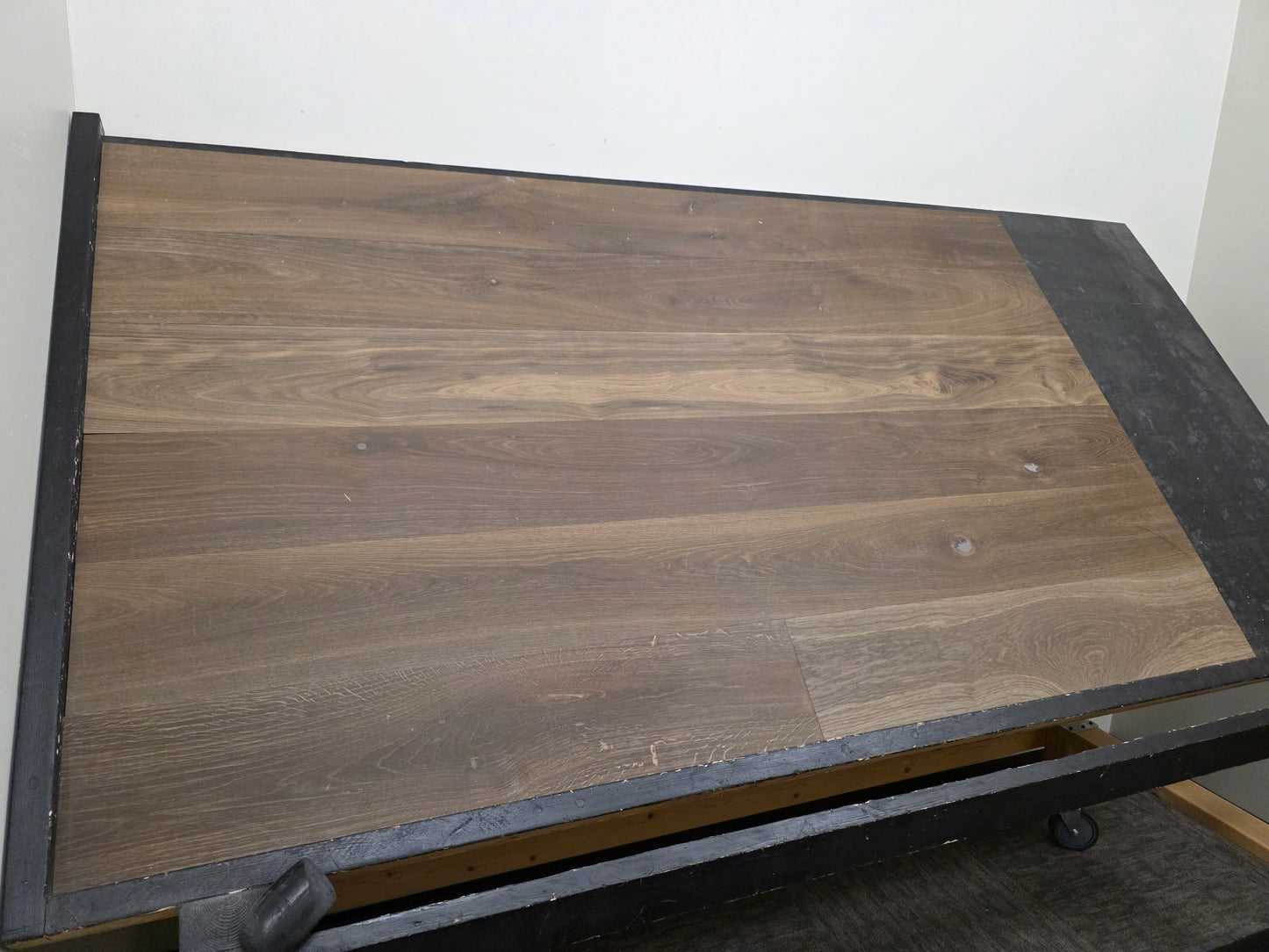 smoked European oak hardwood flooring on racking table