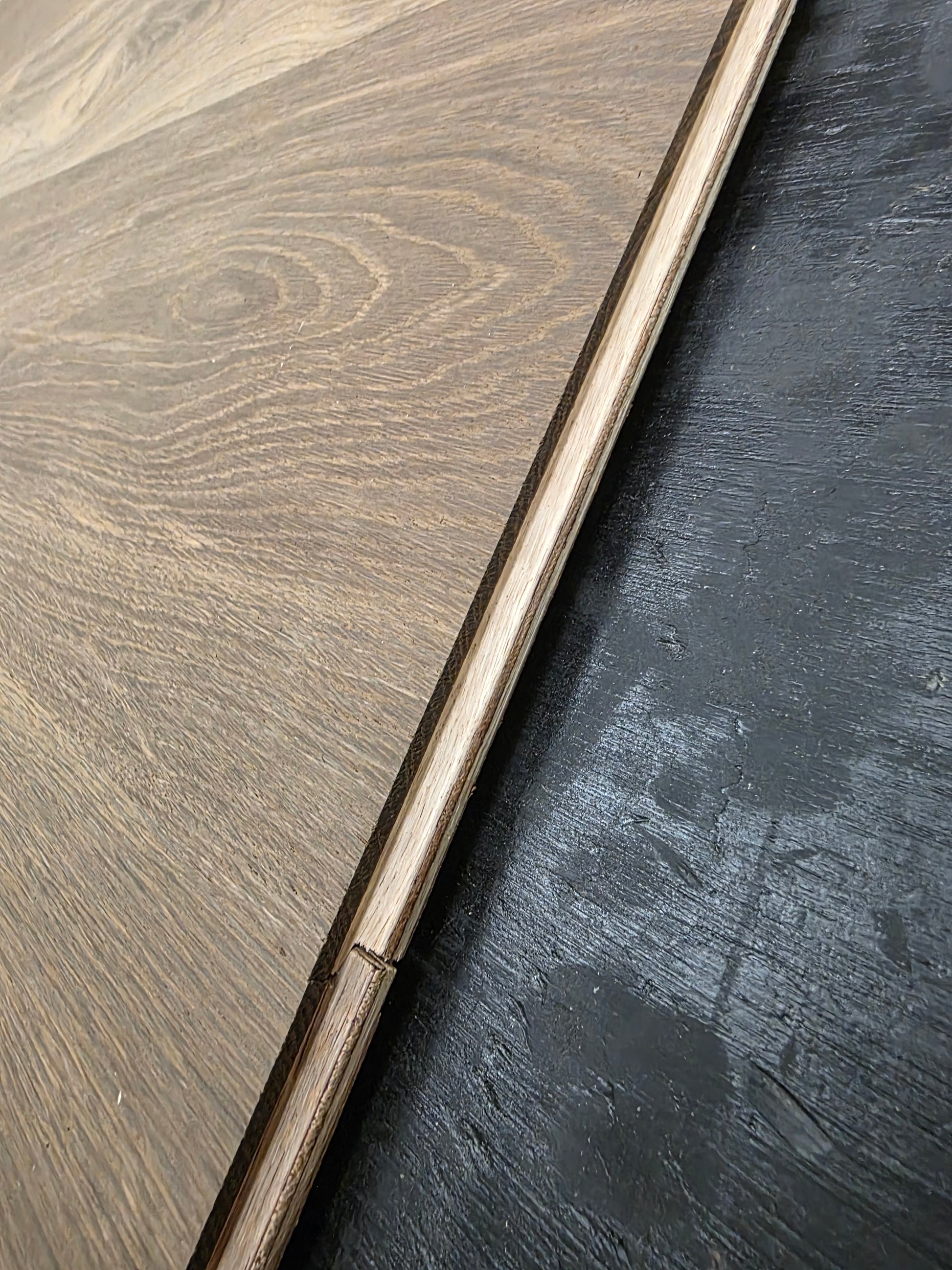 smoked European oak hardwood flooring on racking table