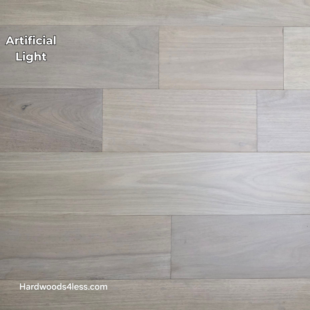 7" x 9/16" Engineered Brazilian Oak Mist Hardwood Flooring. Shown in artificial lighting. 