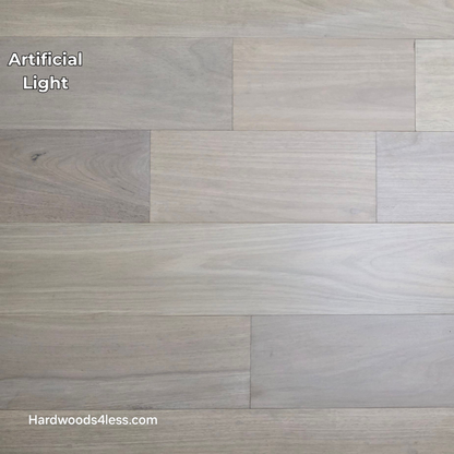 7" x 9/16" Engineered Brazilian Oak Mist Hardwood Flooring. Shown in artificial lighting. 