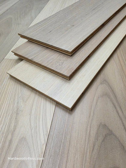7 x 916 Engineered Brazilian Oak Pearl Hardwood Flooring. Shown as 3 planks stacked on top of eachother.