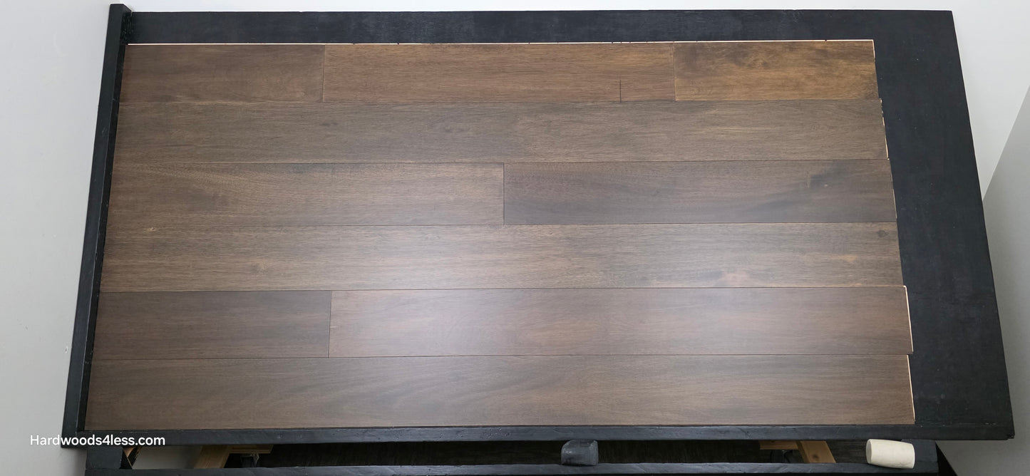 7" x 9/16" Engineered Brazilian Oak Pebble Hardwood Flooring. Shown on a black shooting table. Shot from center.