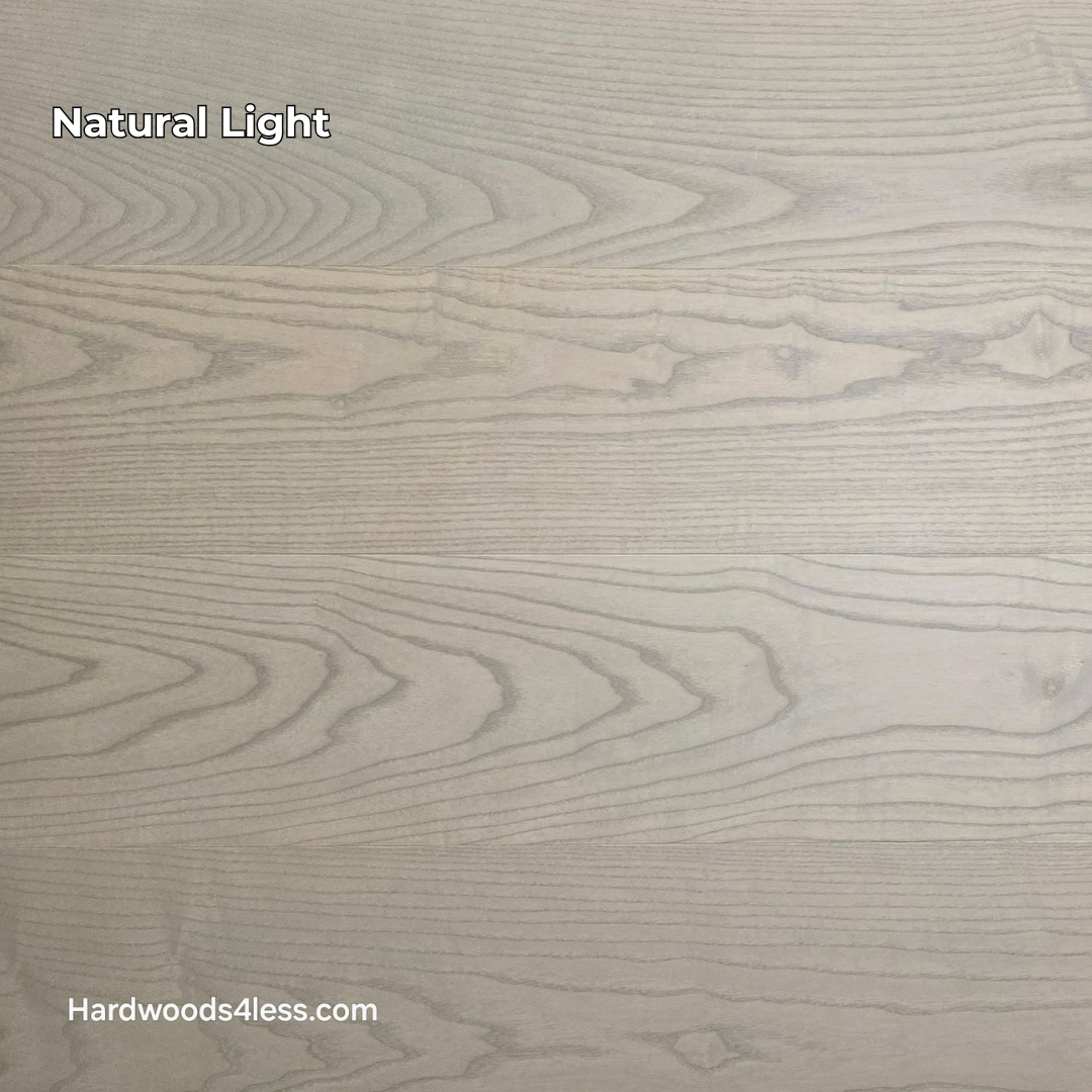 8.11" x 7/16" Modernized Engineered Ash Foster Hardened Hardwood Flooring. Shown in natural lighting.