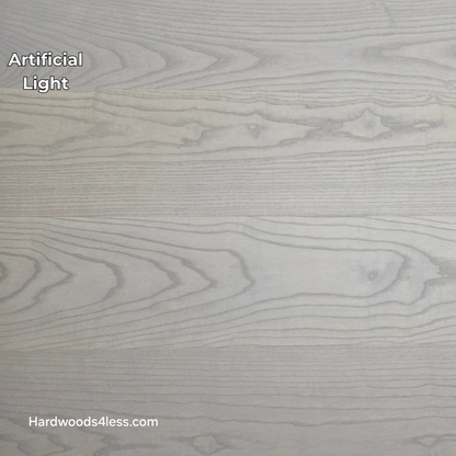 8.11" x 7/16" Modernized Engineered Ash Foster Hardened Hardwood Flooring. Shown in artificial lighting.