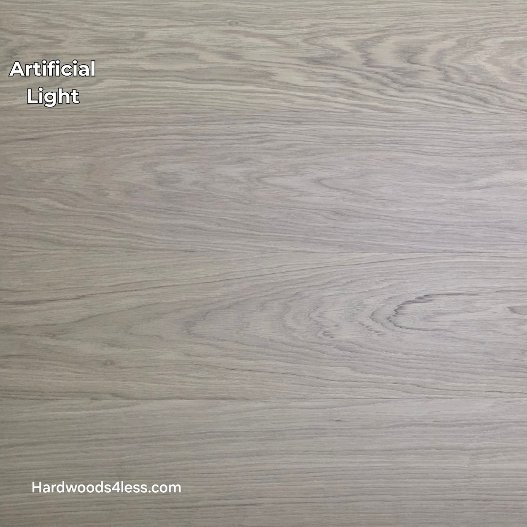 8.11" x 7/16" Modernized Engineered European Oak Gropius Hardened Hardwood Flooring. Shown in artificial lighting.